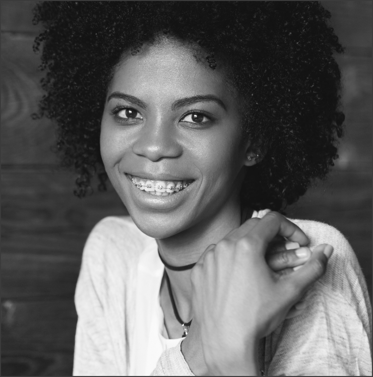 Headshot Of Black Romantic Looking Girl With Brace 5SUGQHM@2x